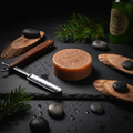Men's Savage loofah shave soap bar on dark slate with straight razor and cedar wood